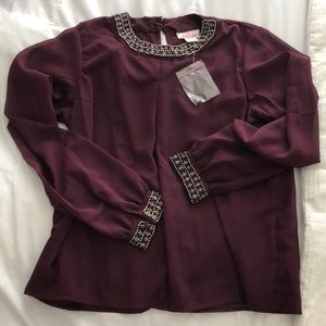 NWT plum shirt with beading on sleeves and collar